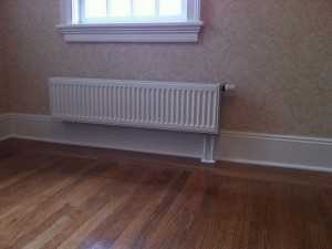 Hot water panel radiators. They are an alternative to baseboard heat or cast iron radiators.