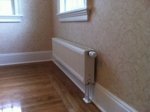 Hot water panel radiators. They are an alternative to baseboard heat or cast iron radiators.